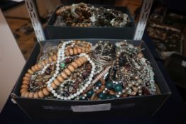 A group of assorted costume necklaces etc.