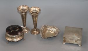 A silver cigarette box, pair of silver posy vases, bonbon dish and a silver and tortoiseshell