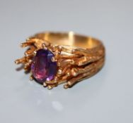 A 1970's modernist 9ct gold and amethyst ring, size N/O.