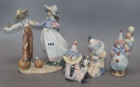 A Lladro group and three clowns