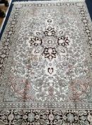 A silk carpet 270 x 177cm