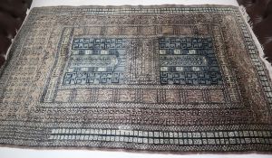 A grey part silk rug 190 x 125cm