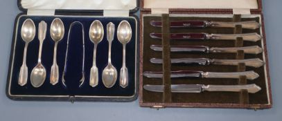 Three cased silver cutlery sets, coffee spoons with tongs, tea knives and six pairs of dessert