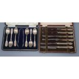 Three cased silver cutlery sets, coffee spoons with tongs, tea knives and six pairs of dessert