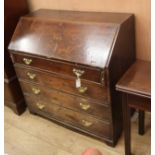 A George III oak bureau W.107cm