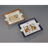 Two Hermes ashtrays, one decorated with a lion and lioness, the other leopards