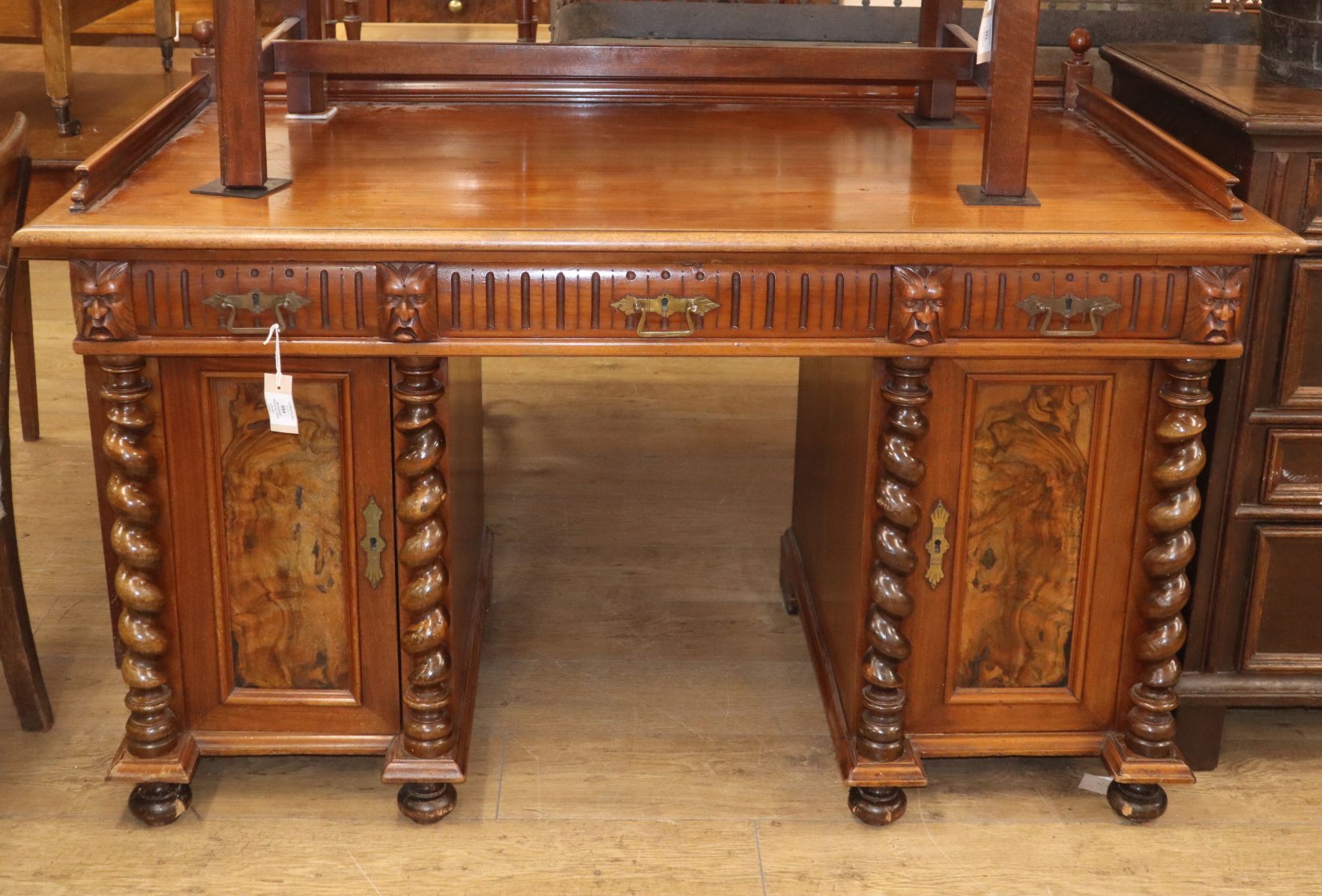 A Victorian mahogany pedestal kneehole desk W.137cm