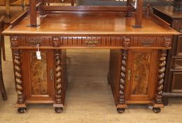 A Victorian mahogany pedestal kneehole desk W.137cm