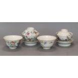 A pair of 20th century Chinese porcelain small bowls, decorated in polychrome with phoenix, and