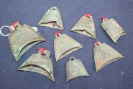 Eight Chinese bronze models of temple bells, Warring States period or Han dynasty