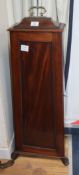 A mahogany tapered cupboard H.102cm