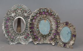 Three Mexican sterling 925, amethyst and turquoise set photograph frames, largest 12.4cm.