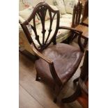 A George III mahogany elbow chair