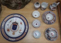 A group of 18th century Chinese and Japanese export Imari cups, tea bowls and a vase together with a
