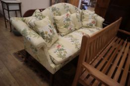 A near pair of George III style mahogany camel-back settees larger W.220cm