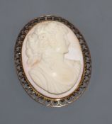 An Italian cameo brooch in 9ct gold pierced mount, 59mm.