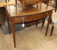 A Regency mahogany bow-fronted side table fitted drawers on tapered legs W.90cm