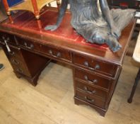 A reproduction mahogany pedestal desk W.122cm