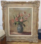 Continental School, oil on canvas, Still life of roses in a vase, indistinctly signed, 49 x 38cm