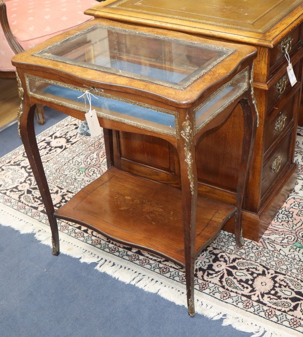 An early 20th century marquetry inlaid kingwood bijouterie table W.62cm