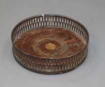 An early 20th century Tiffany and Co. sterling mounted magnum coaster, 15.3cm.