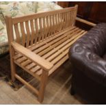 A classic style teak garden bench W.190cm