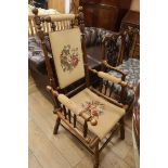 A Victorian tapestry upholstered turned framed armchair