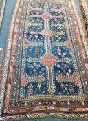A Tabriz blue ground carpet 235 x 141cm