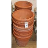 Twelve terracotta garden pots Diameter 24cm