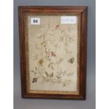 An early 19th century silkwork panel of flowers and a bee, framed