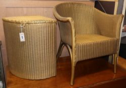 A Lloyd loom chair and corner wash basket