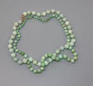 Two jadeite bead necklaces, largest 45cm.