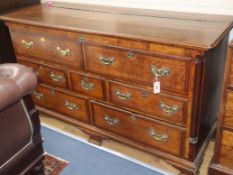 A mid 18th century banded oak mule chest, with rising top, two dummy and five long drawers W.158cm