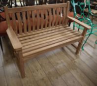 A classic style teak garden bench W.130cm