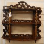 A mahogany three tier wall shelf W.46cm