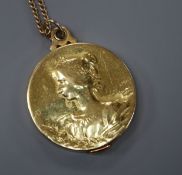 An early 20th century French Art Nouveau yellow metal mirror locket, signed F. Rasumny, on a fine