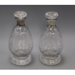 A pair of silver mounted decanters