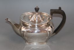A George V silver teapot by Roberts & Belk, Sheffield, 1911, gross 18 oz.