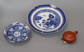 A Chinese Yixing teapot, a Chinese blue and white plate and a Japanese dish (3)