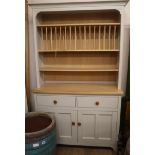 A modern Ercol painted ash dresser W.120cm