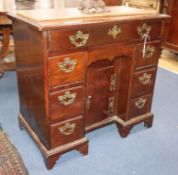 A George III mahogany kneehole desk W.80cm