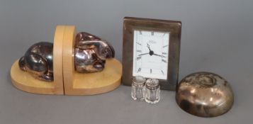 A quantity of mixed silver including a modern pair of rabbit bookends, a mounted timepiece, sugar
