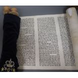 Two Torah scrolls, one on parchment