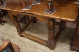 A 17th century style rectangular oak side table (incorporates old timber) L.128cm