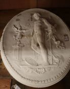 An oval relief moulded plaster classical plaque H.80cm