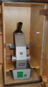 A Comparison microscope unit, no.128, cased, a Spencer Buffalo USA microscope microscope, no.148608,