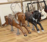 A pair of mid 20th century fibreglass fairground horses W.108cm