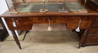 A 19th century French mahogany kneehole writing table W.128cm
