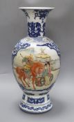 A Chinese blue and white baluster vase, with a polychrome painted panel height 47cm