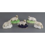 Five Samuel Alcock porcelain figures of recumbent sheep, c.1835-50, impressed '8' and '9', L. 9.